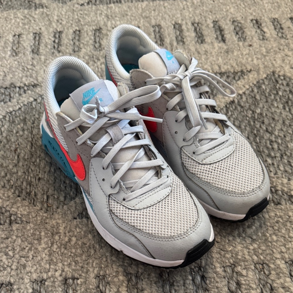Nike women’s 7.5 Air Max Gray and Blue Sneakers with orange Accents